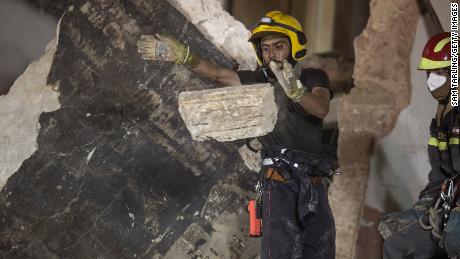 Photo of Beirut rescuers detect signs of life in rubble 30 days after explosion